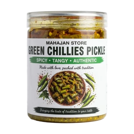 A traditional Indian green chilli pickle (lal mirch ka achar) in a ceramic bowl, glistening with oil and mixed with fennel and mustard seeds."